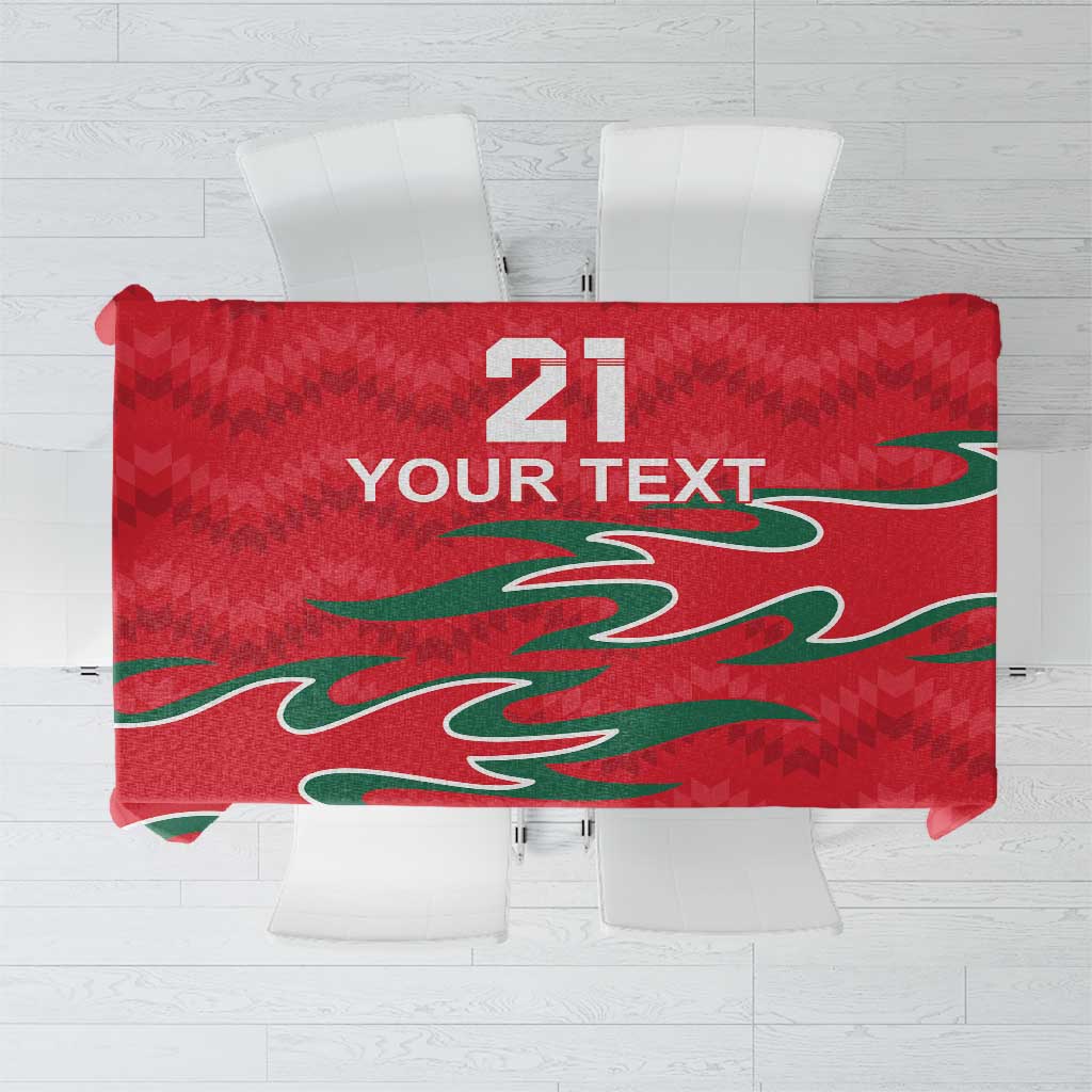 Red custom tablecloth with green pattern and large “21 Your Text” design.