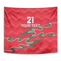 Red tapestry close-up with 21, 'YOUR TEXT,' and green flame-like pattern