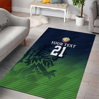 Cricket area rug with green camouflage pattern and navy, 'Your Text 21' graphic