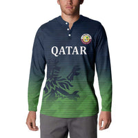 Cricket button sweatshirt on-model, Qatar text and crest, navy-to-green gradient