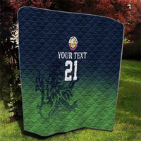 Green and dark blue quilt blanket with crest logo, custom text, and number 21