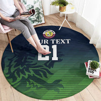 Round green cricket carpet with large "YOUR TEXT 21" and crest emblem