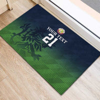 Cricket rubber doormat angled view with crest, YOUR TEXT, and 21 over flame-style design