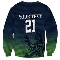 Custom cricket sweatshirt, back print YOUR TEXT 21 with green lion on navy, crew neck
