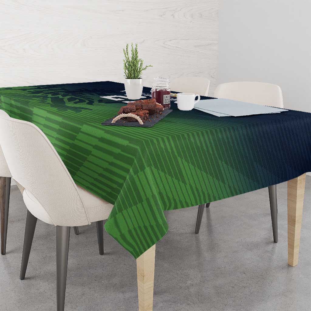 Green sports-pattern tablecloth with dark edge detail and corner drape
