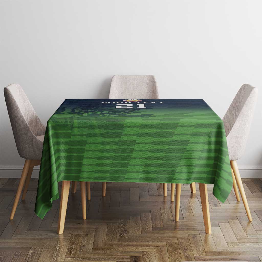 Green patterned tablecloth on dining table with chairs, square top coverage