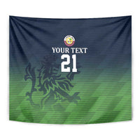 Close view of green-blue tapestry with crest, “YOUR TEXT”, and number 21