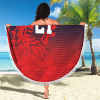 Round beach blanket with red lion design, large "21" number, and white fringe trim