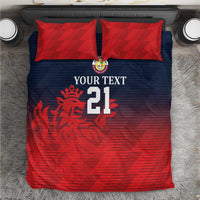 Red and dark blue cricket bedding set with two red pillow shams and number 21 design