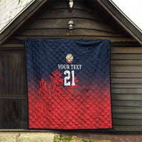 Cricket quilt hanging indoors/outdoors with navy top, red bottom, crest, flames and 21