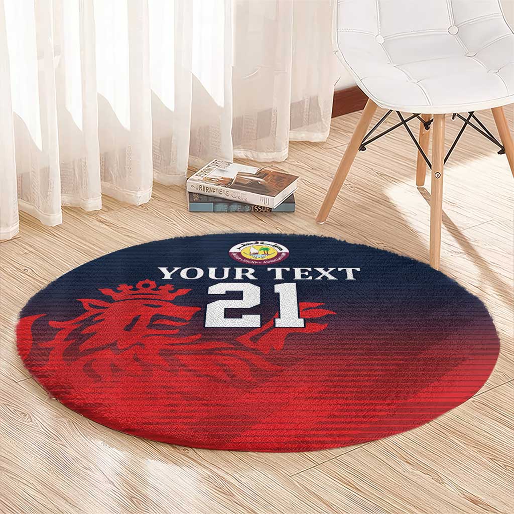 Round sports carpet in red and navy with 'YOUR TEXT 21' and lion emblem near edge