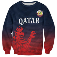 Crewneck sweatshirt with red-to-navy stripe pattern, QATAR graphic and cricket emblem