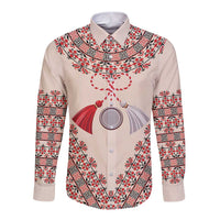 Beige long-sleeve button shirt with red and white folk embroidery at chest and yoke