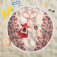 Round beach blanket with tassel fringe and red-and-black folk pattern, bow and dresses print