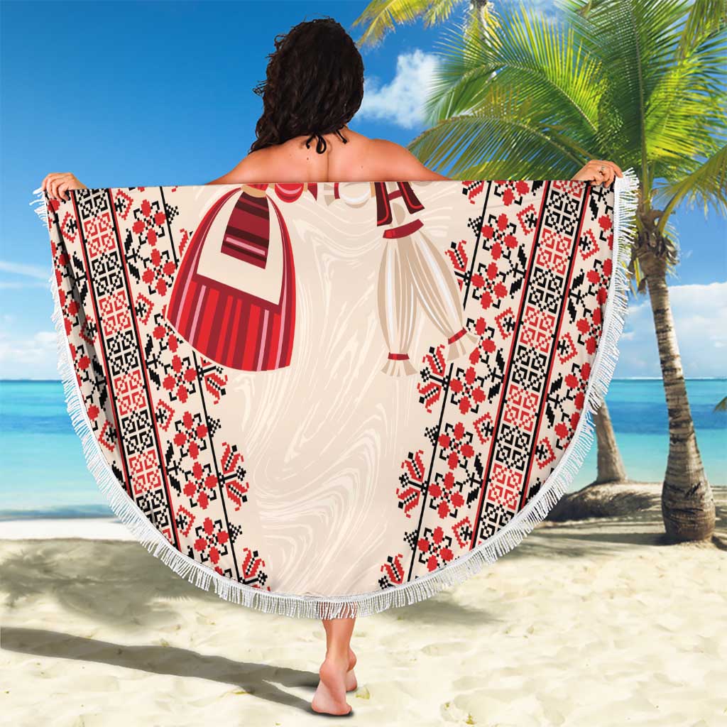 Round beach blanket with fringe edge, white fabric and red folk dress pattern with bows