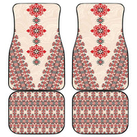 Beige car mat set featuring red and black geometric folk embroidery, full coverage