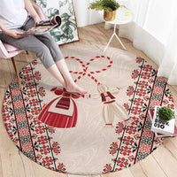 Beige round carpet with red and white folk borders and martenitsa figures