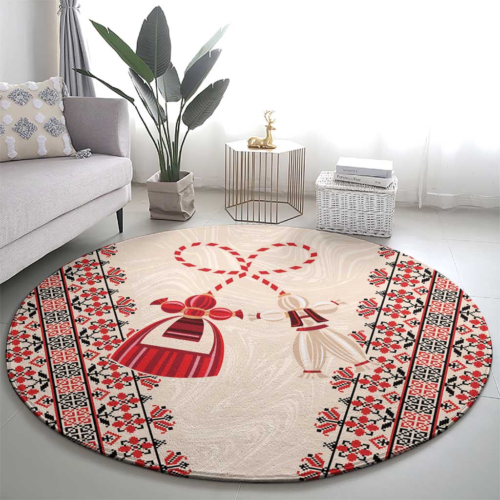 Beige round carpet with red-and-white martenitsa hearts and border stripes on floor