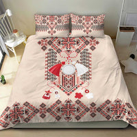 Beige duvet cover with bold red, white, and dark blue folk embroidery; two matching pillowcases