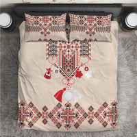 Beige bedding set with two square pillowcases and traditional red geometric embroidery