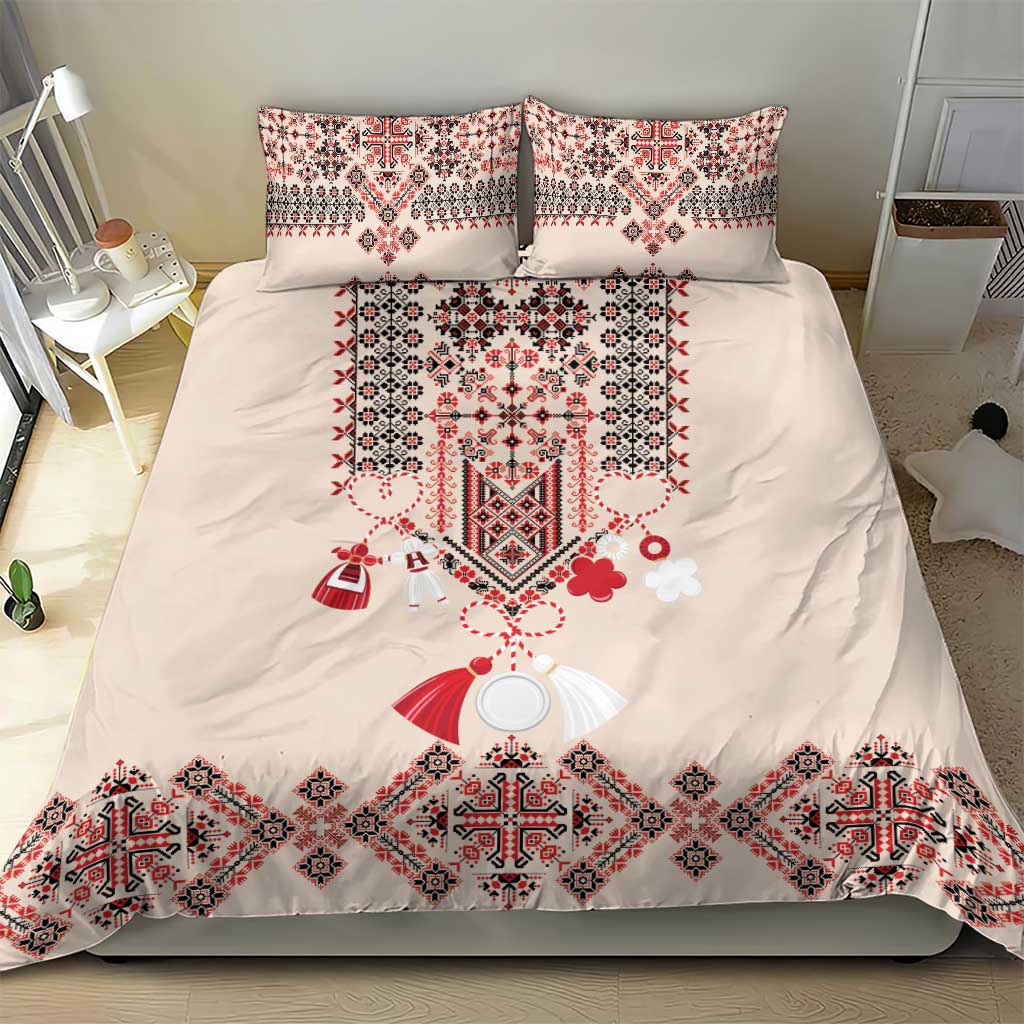 Beige duvet with two pillowcases featuring red folk embroidery and decorative hanging motifs