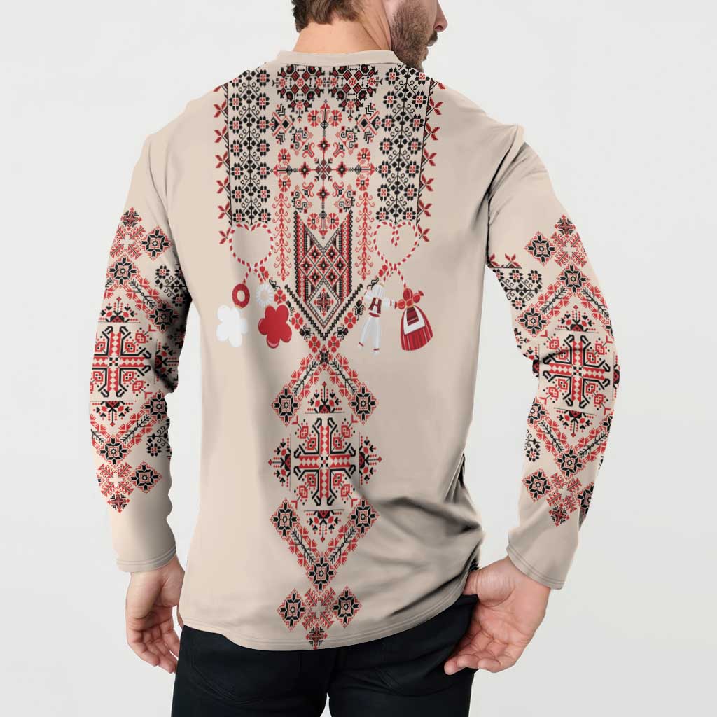 Beige button-placket sweatshirt, back view, long sleeves, red/white folk embroidery, on model