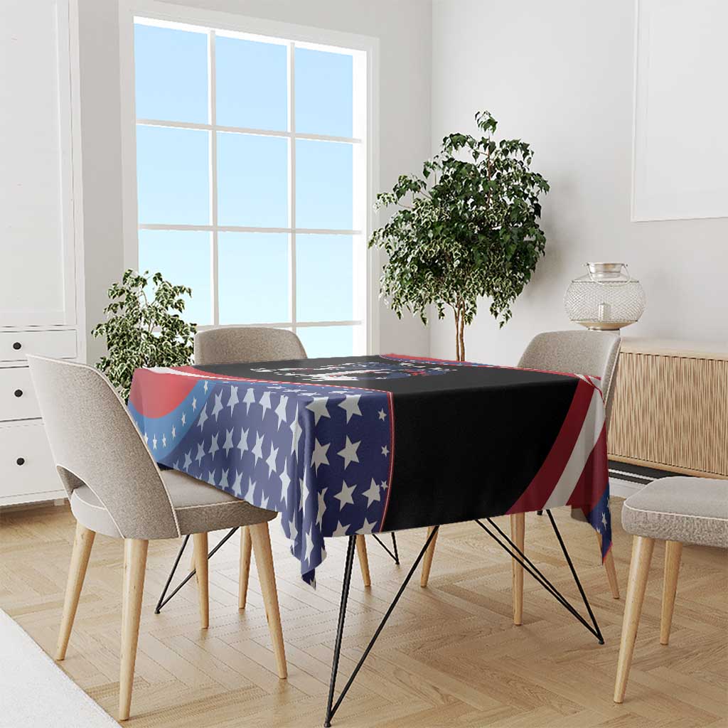 4th of July tablecloth draped over table edge with blue star field and red-white stripes