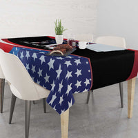 American flag themed tablecloth with blue star pattern and red-white stripes across table