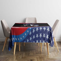 Blue star and red-white stripe 4th of July tablecloth on dining table with chairs