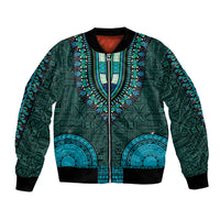Teal dashiki-style bomber jacket with front zipper, ribbed cuffs, and tapa pattern panels.