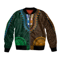 Green dashiki-style bomber jacket with zip front, ribbed cuffs, geometric panel design
