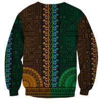 Unisex dashiki-style sweatshirt back with patchwork green, brown, blue, gold tapa patterns