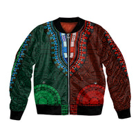 Dashiki bomber jacket, half green/half red tapa patterns, black ribbed collar and cuffs