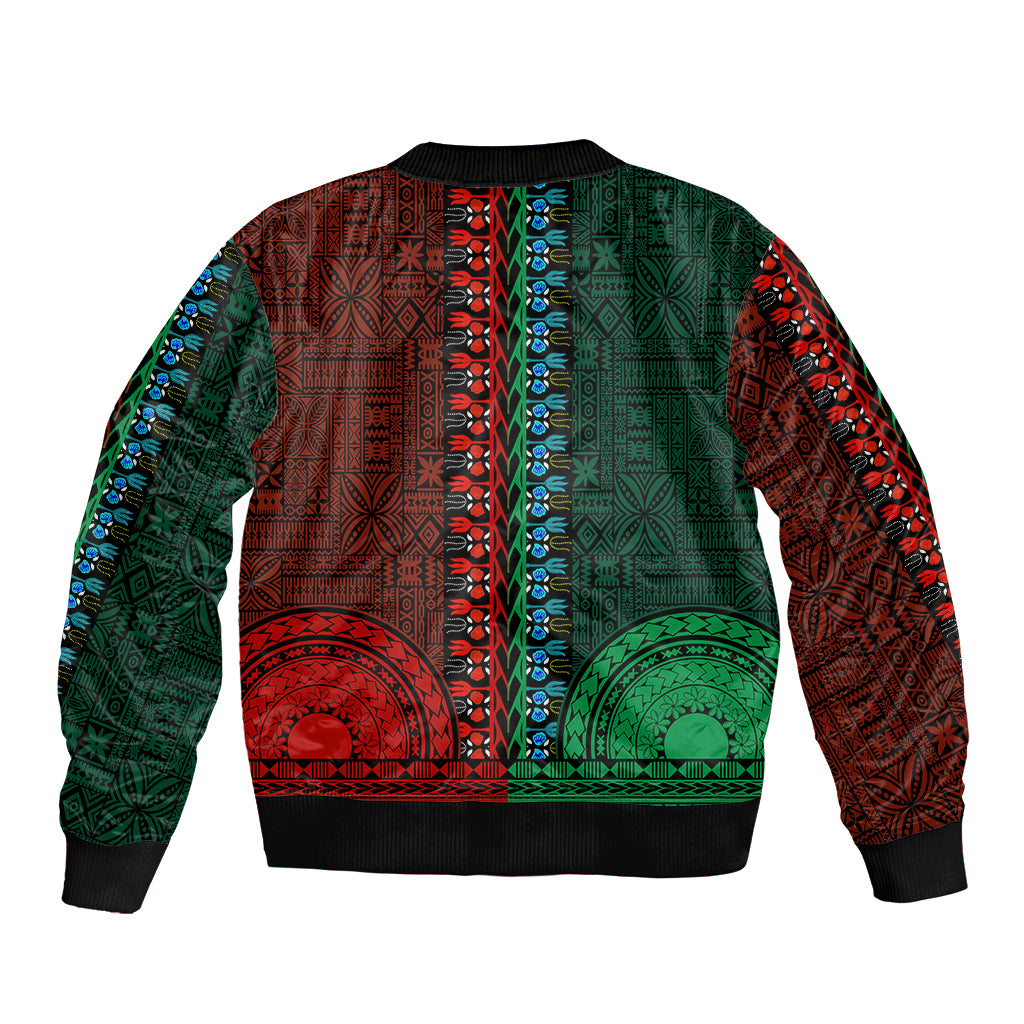 Dashiki bomber jacket back, half green/half red tapa patterns, black ribbed hem and cuffs