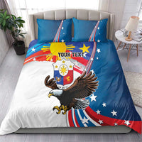 Blue bedding set with eagle and sun artwork, red-white stripes, and “YOUR TEXT” on duvet