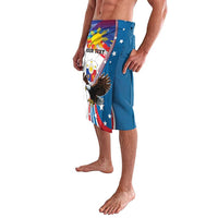 Blue knee-length shorts with bald eagle, sun, and flag artwork