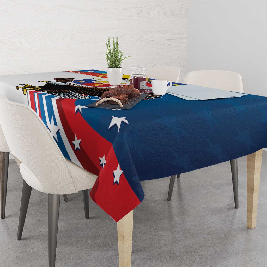 Personalized blue tablecloth draped over dining table with eagle sun and star motif