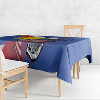 Blue tablecloth draped on table with eagle and flag stripe graphic