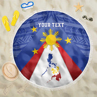 Round beach blanket with blue, red, and white Philippines flag design and white fringe