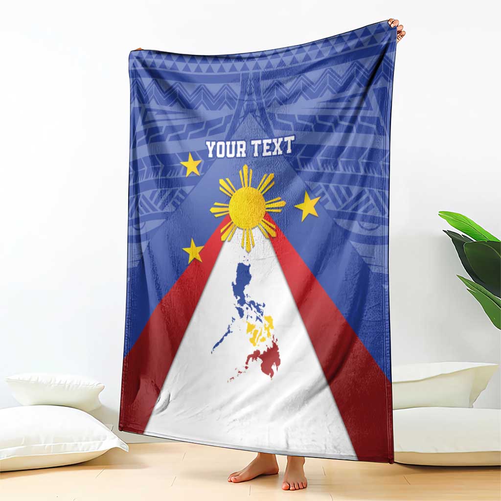 Blue blanket with Philippines map, eight-rayed sun and stars, red and white triangle bands