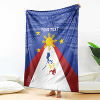 Blue blanket with Philippines map, eight-rayed sun and stars, red and white triangle bands