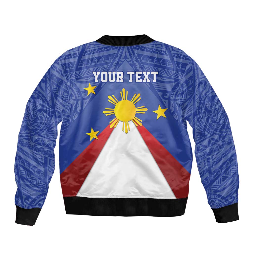 Blue bomber jacket back graphic: sun, stars, red/white/blue triangle, ribbed cuffs
