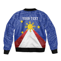 Blue bomber jacket back graphic: sun, stars, red/white/blue triangle, ribbed cuffs