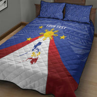 Blue quilt and two pillows with Philippines map, eight-rayed sun emblem and red trim
