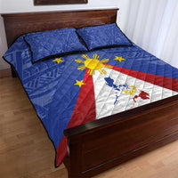 Blue quilt and two pillows with Philippines map, eight-rayed sun, red and white center panel