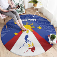 Round blue carpet featuring Pilipinas map, yellow sun rays, red diagonal stripes, and stars