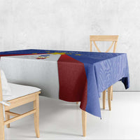 Blue tablecloth with red panel draped over the edge and Philippines sun graphic