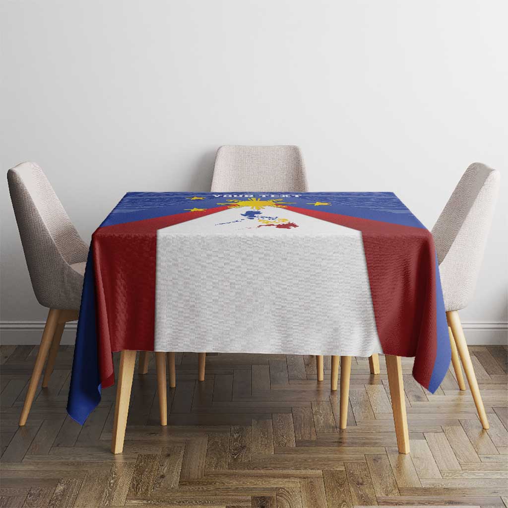 Blue tablecloth with red-and-white Philippines map and sun emblem on dining table