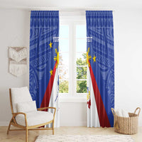 Blue window curtain panels with sunburst emblem and Philippines map, neatly hung