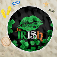 Black round beach blanket with green lips and 'I'm Irish' clover design, white fringe edge